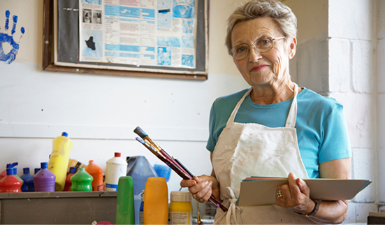A retirement community resident in an art studio