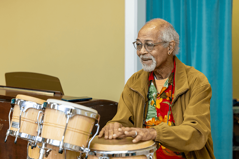 IRE Man Playing Bongos