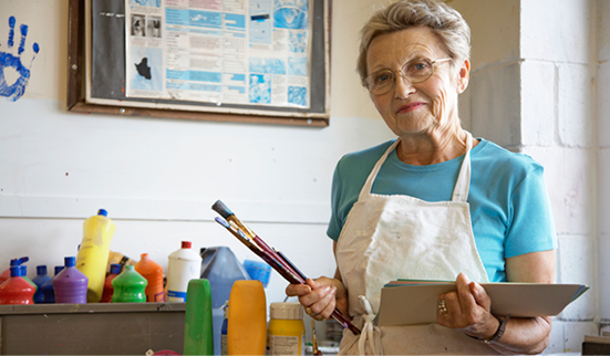 A retirement community resident in an art studio