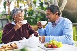 Retired couple drinking coffee