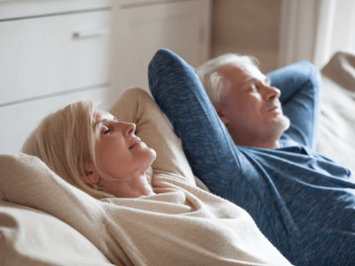 Senior woman and man sleeping happy