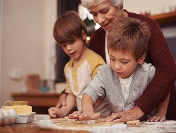 Retired woman babysitting two kids